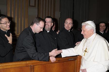Seminarian Jason Doke, now a priest of the Jefferson City diocese, greets Pope Benedict XVI during an audience with fellow seminarians of the North American Pontifical College in Rome in 2010.